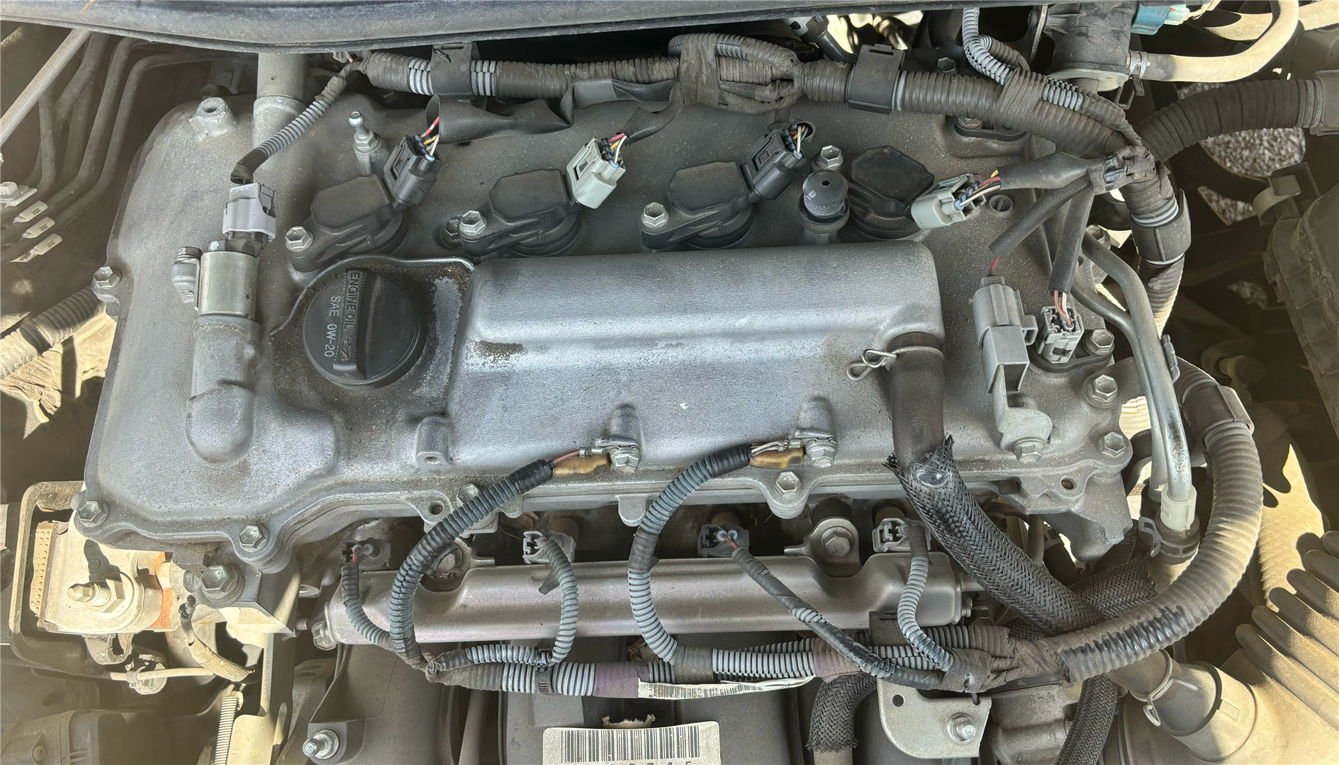 How do I know if I need to replace my vehicle's valve cover?
